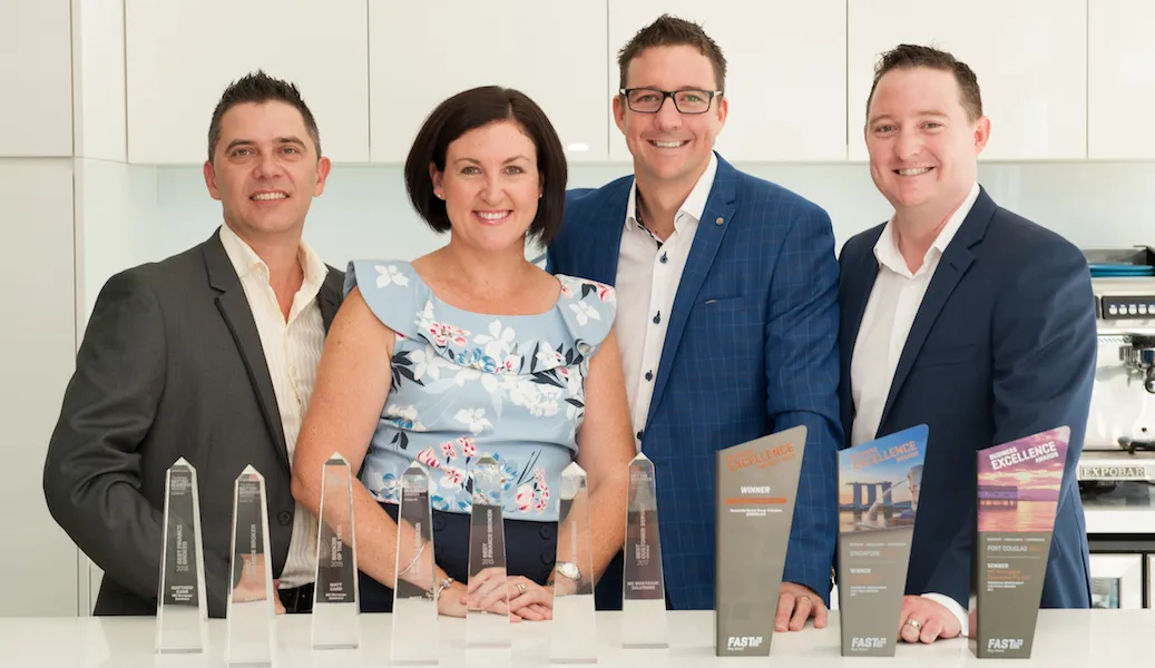 Mortgage broker Brisbane team at MC Mortgage Solutions with their industry awards